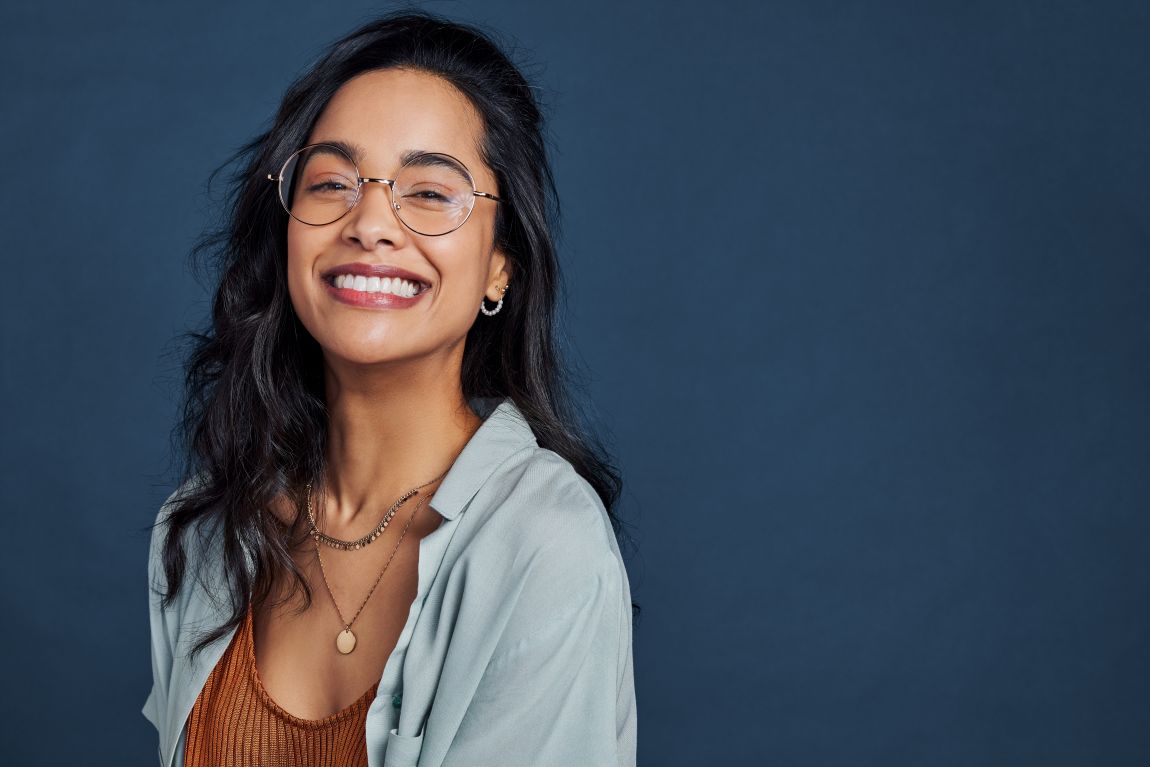 woman smiling after neck liposuction