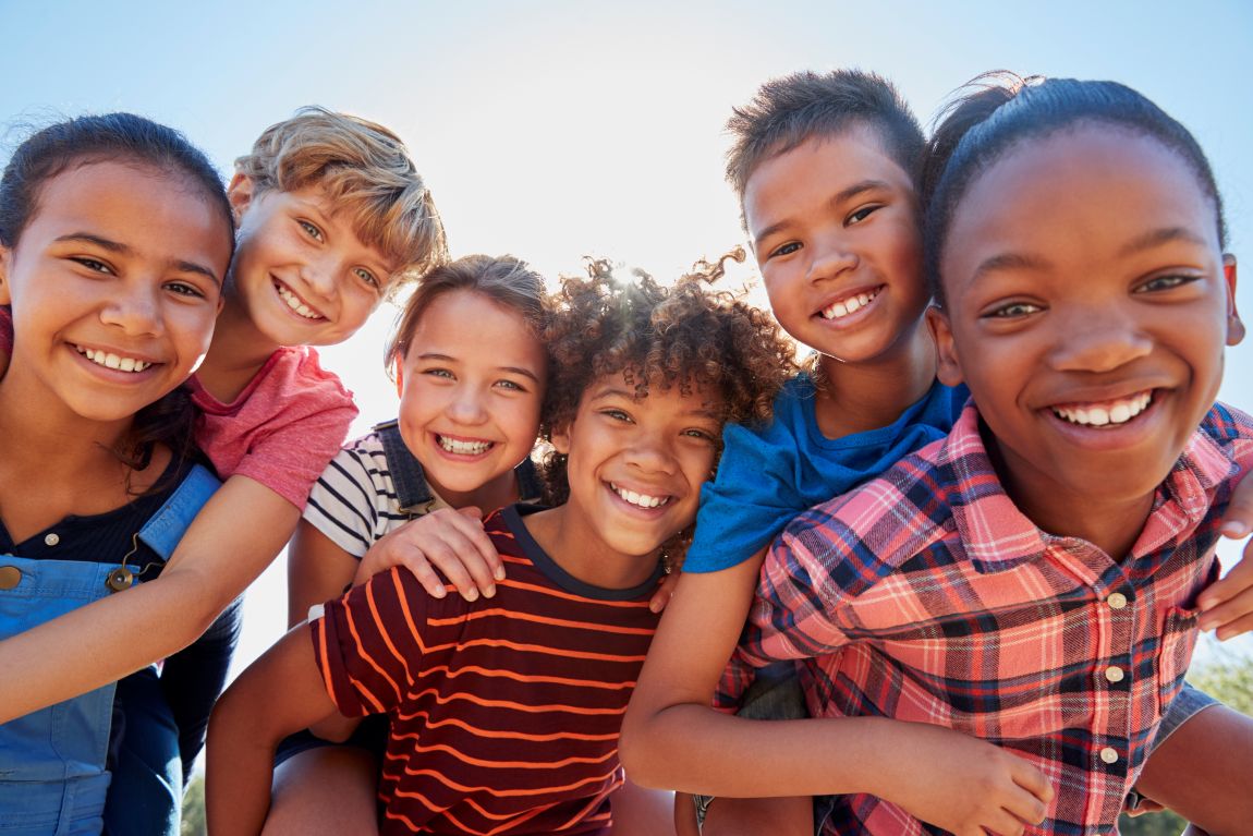 group of happy children smiling